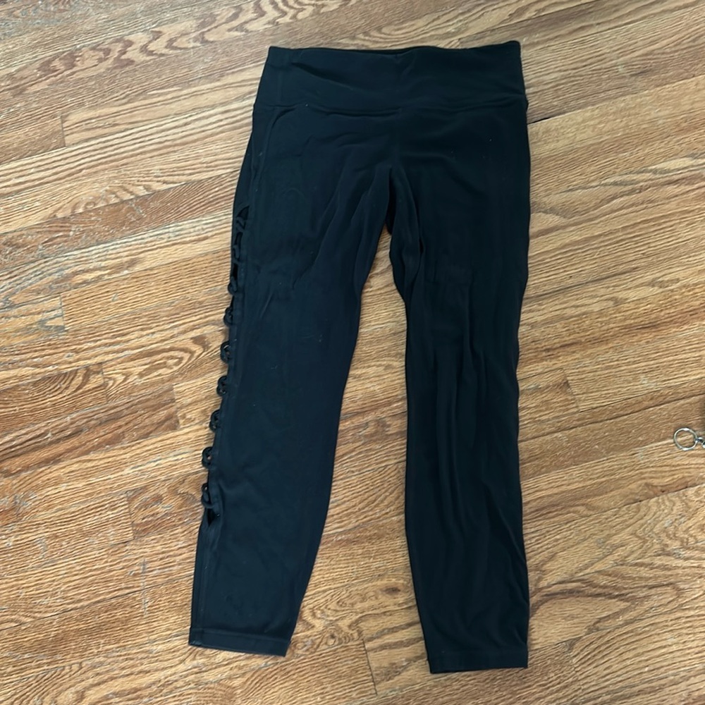Black Athleta 7/8 leggings with cutout design size M